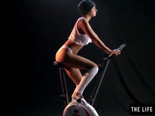 Beautiful Sweaty Teen Humping an Exercise Bike Seat.